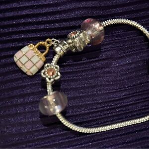 Elegant Silver and Gold Charm Bracelet